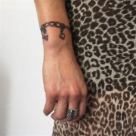 charm bracelet tattoo